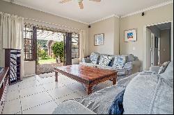 Immaculate home in a tree-lined street.