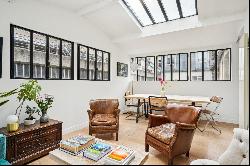 Paris 3rd - Bright Family Apartment with Glass Roof in the Heart of the Marais.