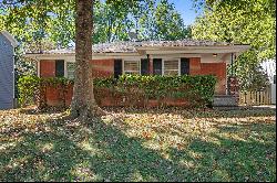 Classic Brick Bungalow with Inviting Curb Appeal in Brookhaven