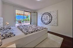 Modern apartment for sale in Ascona with partial view of Lake Maggiore