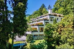 Modern apartment for sale in Ascona with partial view of Lake Maggiore