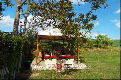 FARMHOUSE WITH POOL FOR SALE ALONG THE RIVER IN TUSCANY, SIENA