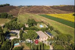 FARMHOUSE WITH POOL FOR SALE ALONG THE RIVER IN TUSCANY, SIENA