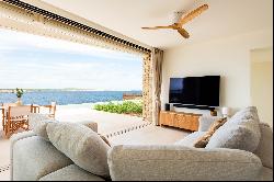 Exquisite beachfront residence available for rent in Menorca.