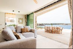 Exquisite beachfront residence available for rent in Menorca.