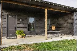 Charming Carriage House, Spacious Workshop with Acreage Await