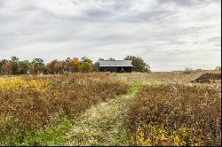 Charming Carriage House, Spacious Workshop with Acreage Await