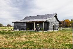 Charming Carriage House, Spacious Workshop with Acreage Await