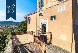 Prestigious frescoed castle with a grand ballroom and tennis court for sale in Loano