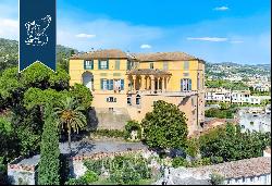 Prestigious frescoed castle with a grand ballroom and tennis court for sale in Loano