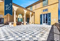 Prestigious frescoed castle with a grand ballroom and tennis court for sale in Loano