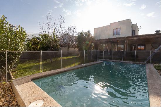 Two-story mediterranean style house in a gated community