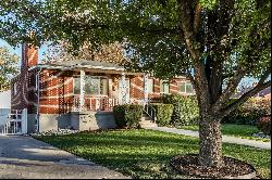 Solid Brick Rambler. Oversized 3 Car Garage.