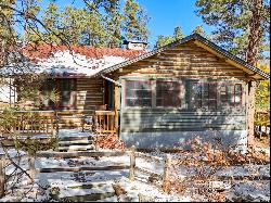 Two turn of the century charming cabins nestled in towering pines