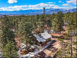 Two turn of the century charming cabins nestled in towering pines