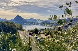 Lugano-Aldesago: modern penthouse apartment for sale with stunning lake views, rooftop te