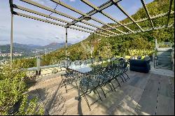 Lugano-Aldesago: modern penthouse apartment for sale with stunning lake views, rooftop te