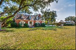 Charming Hal Yoakum Designed Home with Endless Potential on Oversized Lot