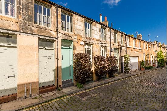 A contemporary two-bedroom mews house situated on one of Edinburgh's most sought-after add