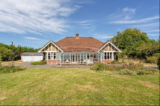 Fantastic opportunity to purchase and redesign (STPP) an attractive mid-century bungalow. 