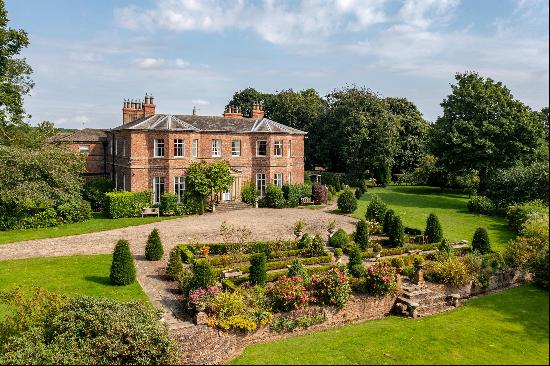 An impressive Grade II listed South facing country residence with far-reaching views and s