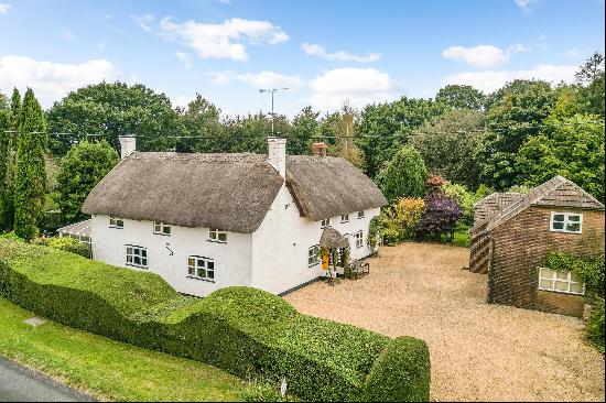 A charming cottage with self-contained studio flat and wonderful south-facing views.