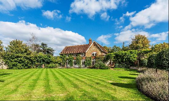 Quite possibly one of the prettiest houses in West Surrey.