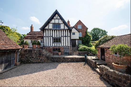 A stunning Grade II listed Farmhouse in rural surroundings.