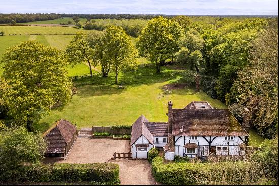 A beautifully presented Grade II listed detached country home with 10.4 acres and over 300