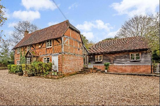 Rural cottage in just over an acre with a detached garage and annexe.