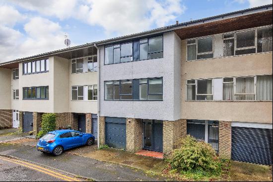 A well presented townhouse set across three floors located in a sought-after and tucked aw