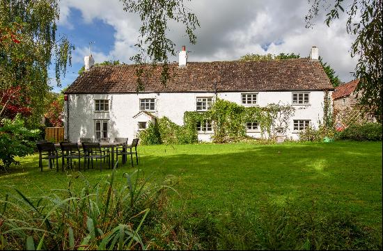 A charming Grade II listed Somerset long house with attractive detached cottage, situated 