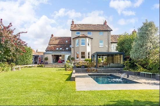 A fully renovated, Grade II listed home with exceptional gardens and far-reaching views in