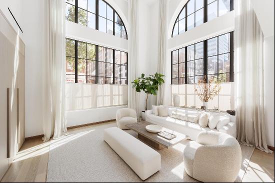 Welcome to 88 Lexington, a stunning duplex loft in the heart of New York City, where ev