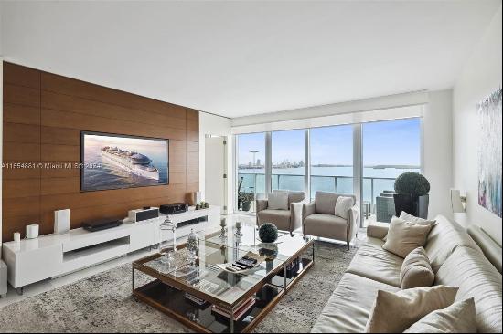 Discover unparalleled luxury in this 3BR/3BA residence with breathtaking Biscayne Bay view