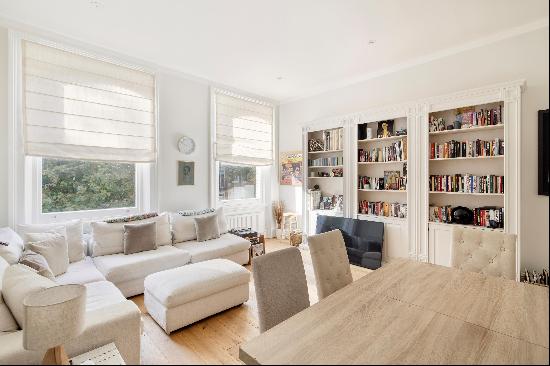 A delightful two bedroom south-facing apartment with high ceilings for sale on the Old Bro