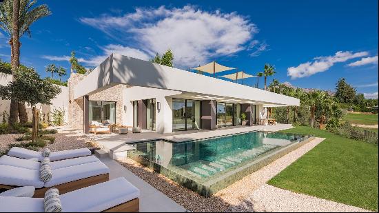 A modern villa directly overlooking the golf course.