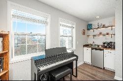 Delightful, Sun-Drenched, & Fully Updated 2 Bed/2 Bath Top-Floor Condo