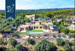 Exclusive newly renovated villa with olive grove and panoramic pool for sale near Imperia