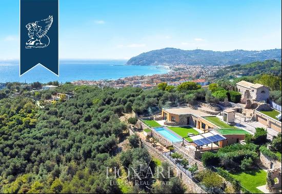 Exclusive newly renovated villa with olive grove and panoramic pool for sale near Imperia