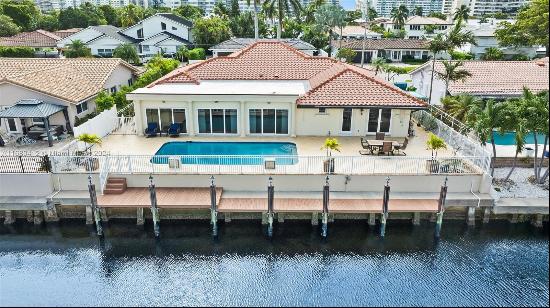 Exceptionally well maintained 4 bedroom residence with direct access to intracoastal water