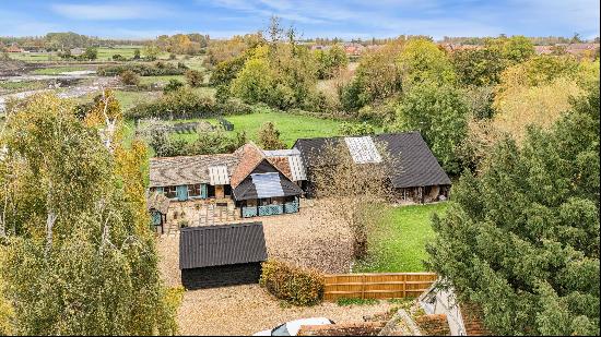 Hidden discreetly at the end of a drive, Barnbrook is a delightful architect-designed timb