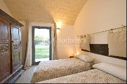 Old farmhouse with olive trees and a swimming pool