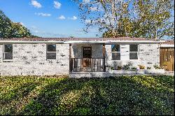 Remodeled Brick Home With Versatile Bonus Room On Corner Lot