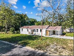 Remodeled Brick Home With Versatile Bonus Room On Corner Lot