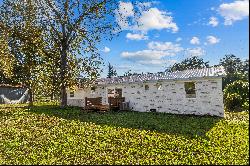 Remodeled Brick Home With Versatile Bonus Room On Corner Lot