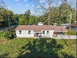 Remodeled Brick Home With Versatile Bonus Room On Corner Lot