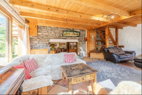 A charming six bedroom semi-detached chalet for sale in Meribel.