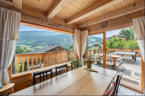 A charming, spacious chalet with mountain views for sale in Méribel.