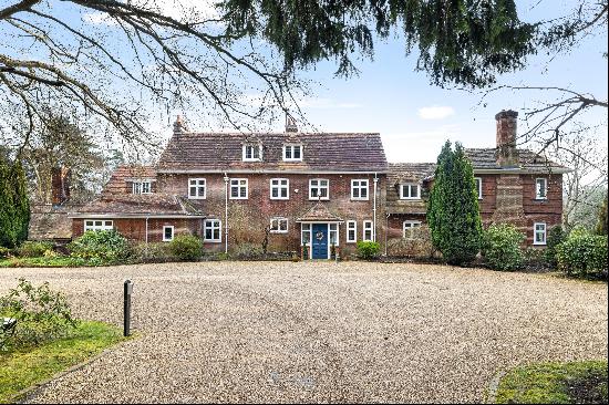 A recently renovated Edwardian country house set within over 4 acres of landscaped gardens